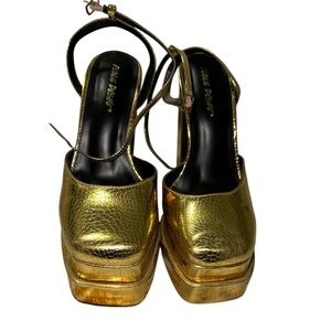 Public Desire platform gold heels. Never worn. No box. Size 9 but fits like a 8.